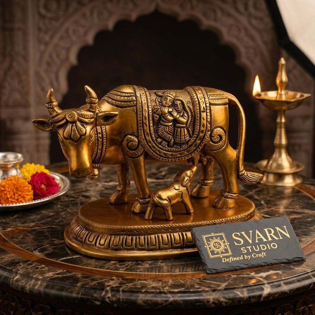 Svarn Studio Handcrafted Brass Kamdhenu Cow with Calf, Radha-Krishna Motif engraved Figurine | 14 × 7.5 × 10 cm, Weight: ~1.113 kg