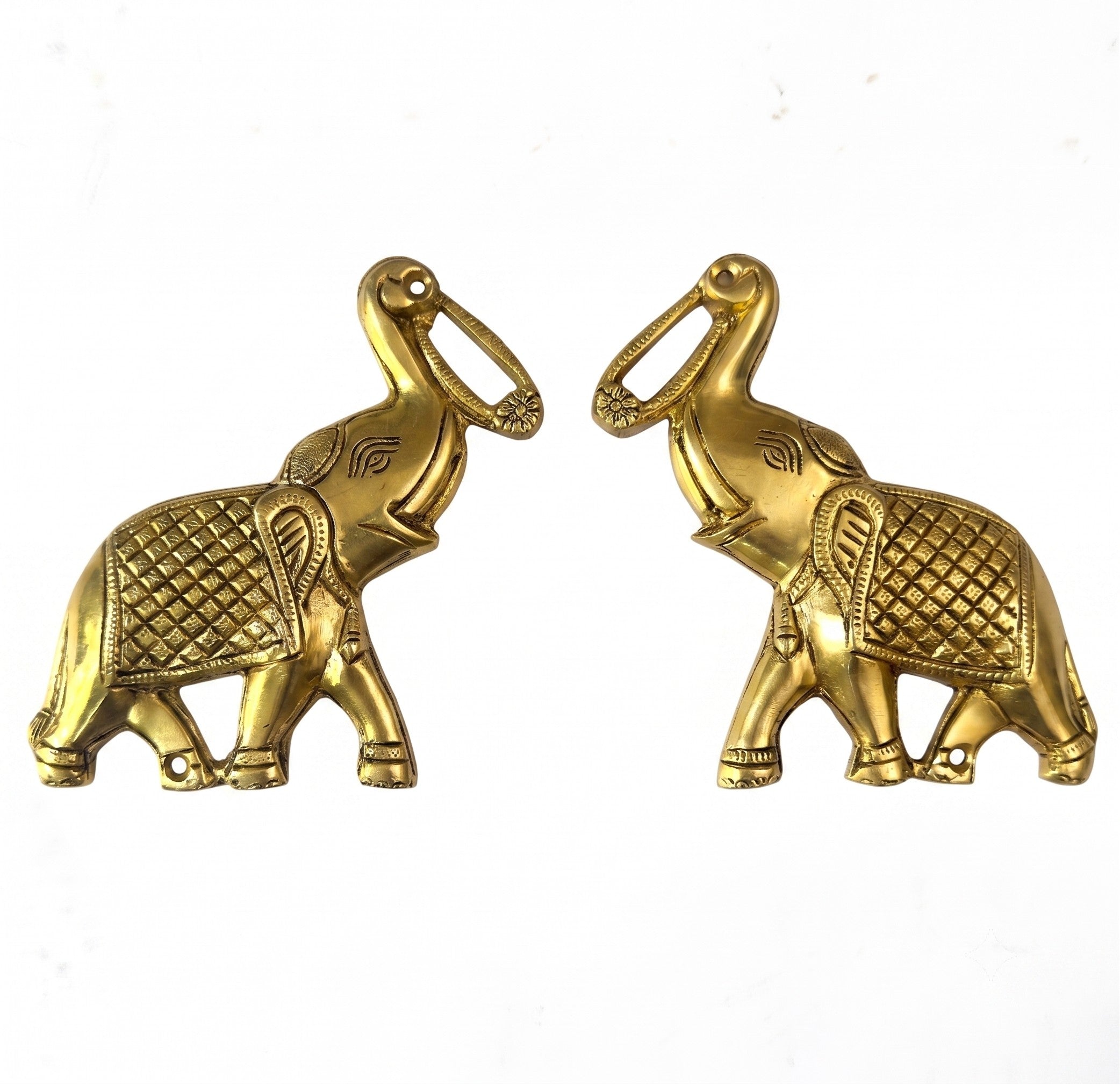 Svarn Studio Brass Trunk-Up Elephant Wall Hanging - Single piece front view on white background showing diamond saddle cloth, lotus trunk tip and engraved eye detail