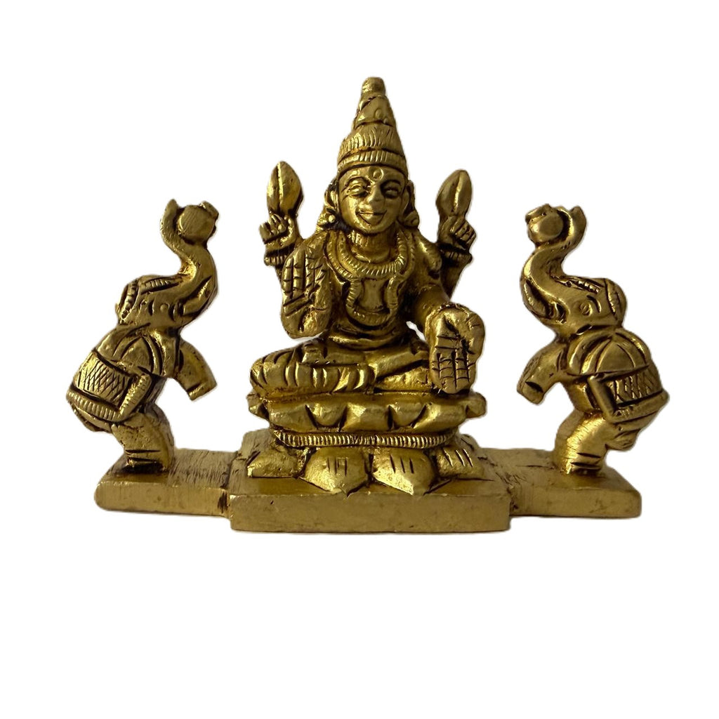 Svarn Studio Pure Brass Gaj Lakshmi Idol - Lifestyle shot on marble console with circular mirror backdrop