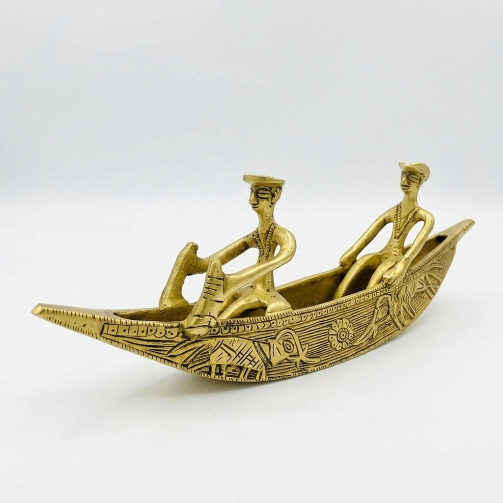 Svarn Studio Pure Brass Kerala Boat Decor Showpiece - Lifestyle shot with South Asian Art books on wooden sideboard