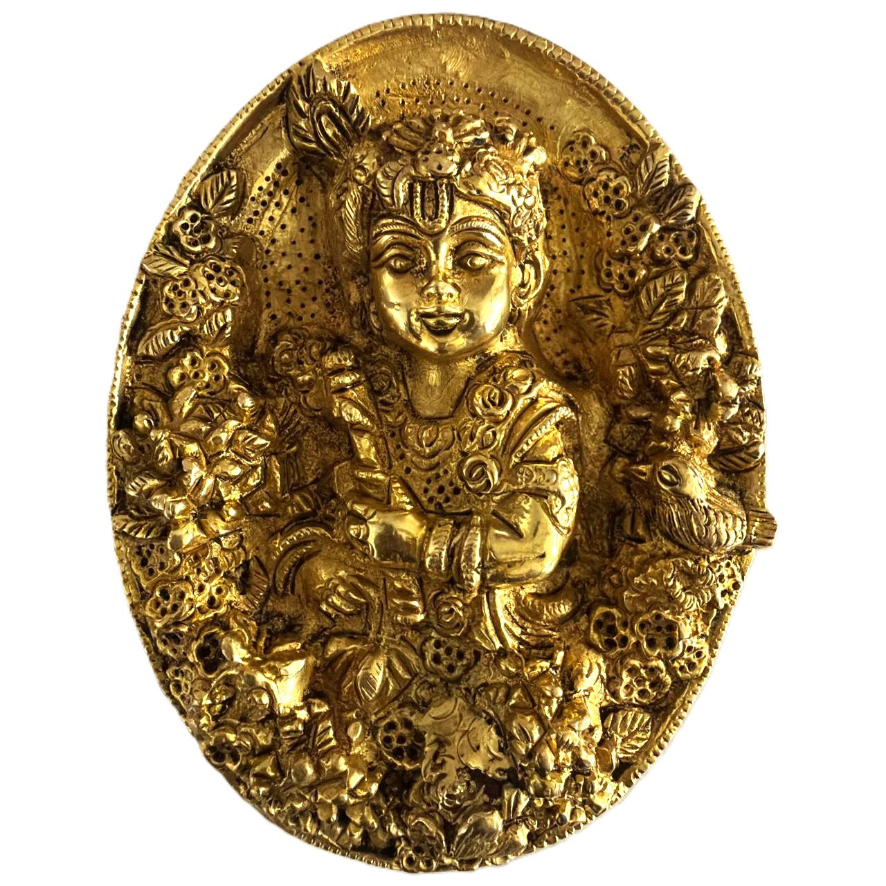Svarn Studio Brass Bal Krishna Oval Wall Decor Plate - Lifestyle shot on rustic wooden surface with jasmine flowers