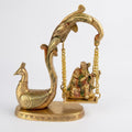 Svarn Studio Brass Radha Krishna Jhoola with Peacock | Yellow Gold | Hand-Enamelled Idol
